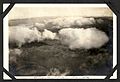 "Above the clouds" aerial photograph of clouds, lake (probably the Bay of Quinte), and fields taken from a Royal Flying Corps aircraft, probably near Camp Mohawk, one of the pilot training camps near (7980486892).jpg