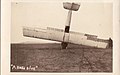 "A nose dive"- photo-postcard of aircraft that has crashed onto its nose, with man to right holding on to the port wing. Presumably taken at Camp Mohawk, Royal Flying Corps training ground near (2695995305).jpg