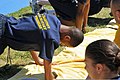 A U.S. Navy junior ROTC cadet born with a birth defect with his right arm performs push-ups during the 2010 Navy Junior ROTC Nationals Academic, Athletic and Drill Competition at Naval Air Station Pensacola 100410-N-IK959-152.jpg